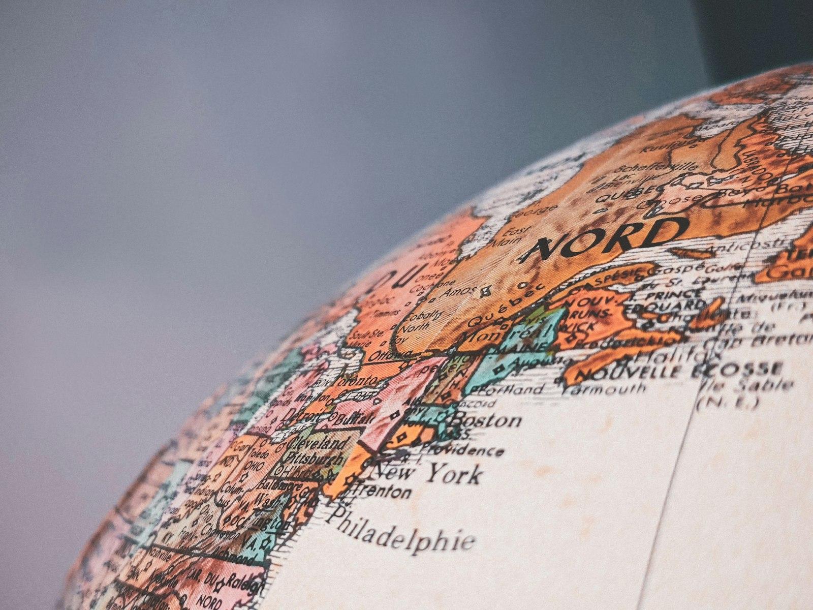 Close view of a globe showing shipping regions